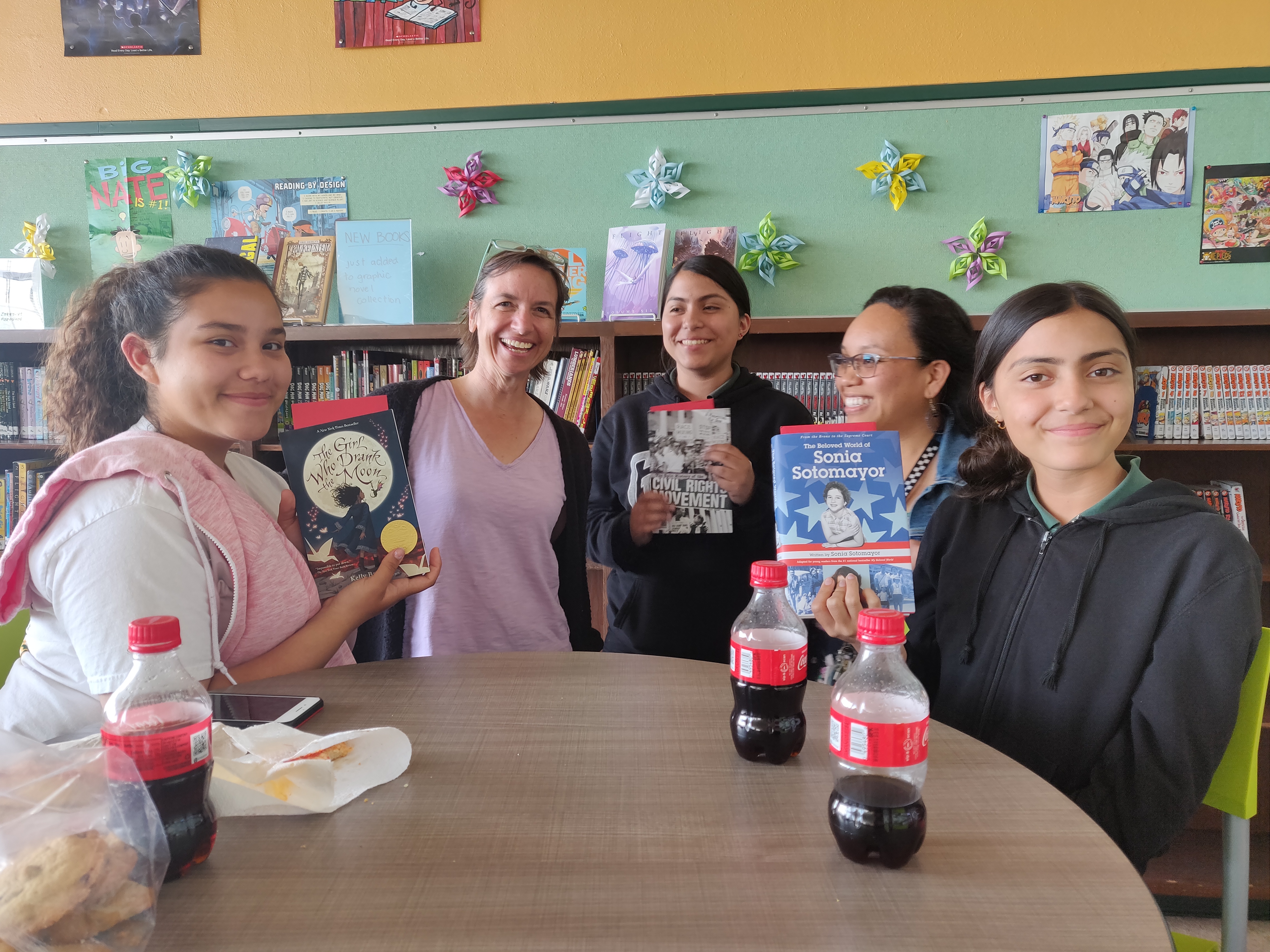 Volunteer reading with students